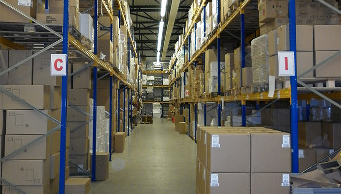 Warehouse shelving and aisles.